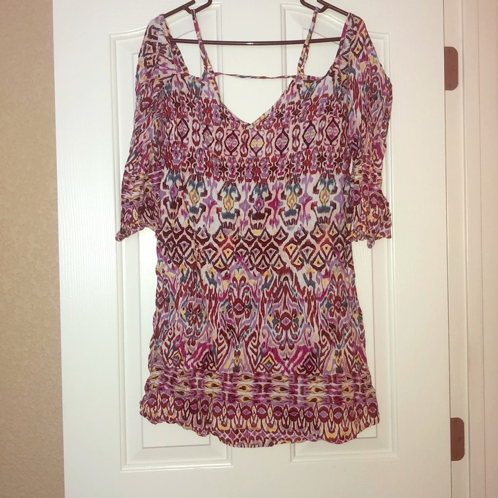 Off the shoulders dress.